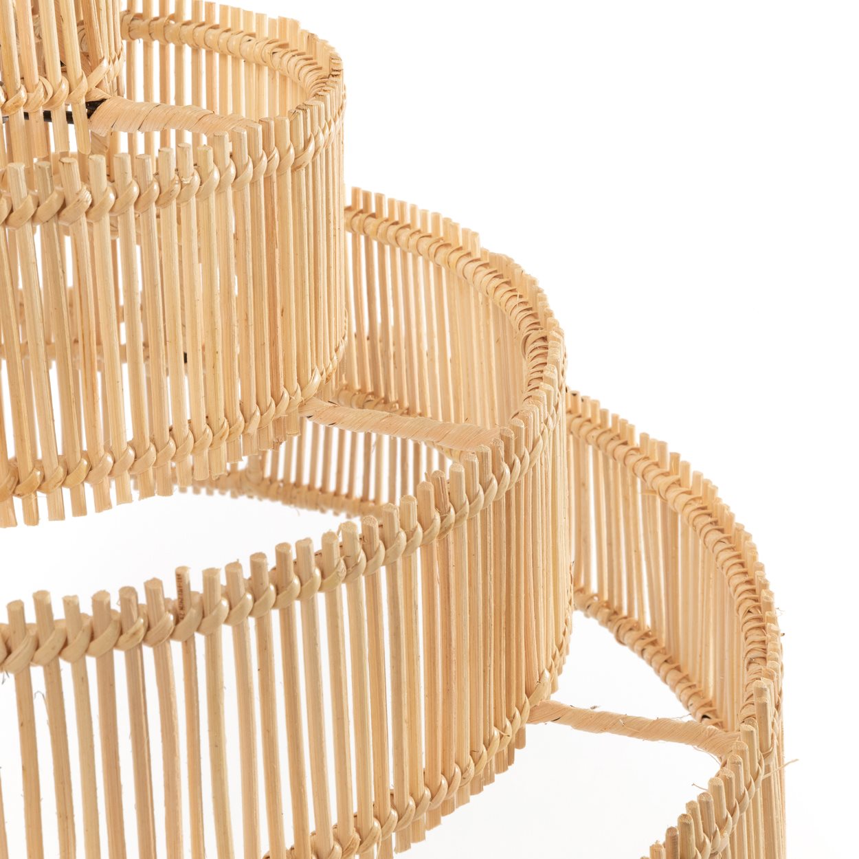 Natural rattan pendant lamp in a cake-like shape, offers warm lighting for intimate settings