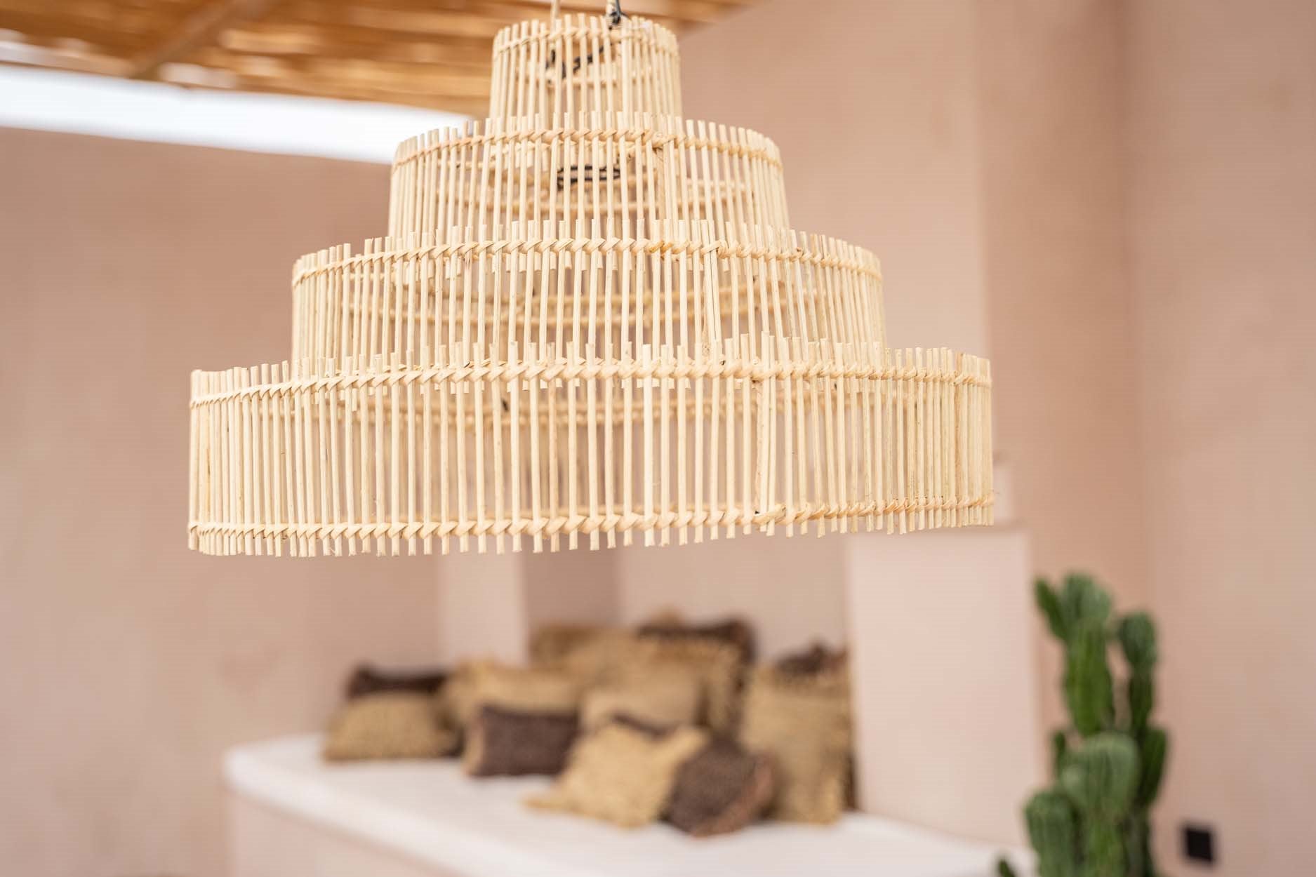 Medium natural pendant lamp shaped like a cake, adds charm and light above your dining table