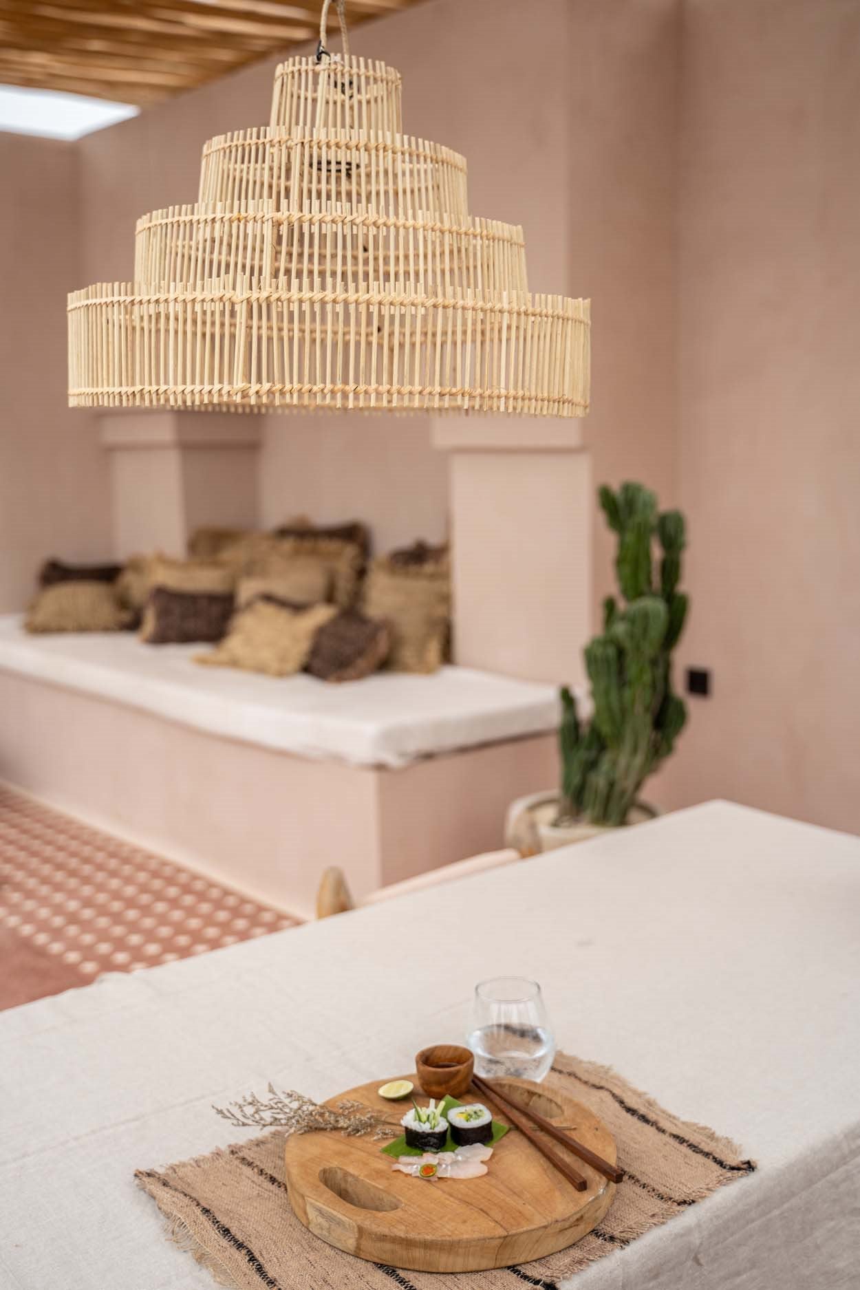 Handwoven rattan wedding cake pendant lamp in natural tone, perfect for cozy table lighting