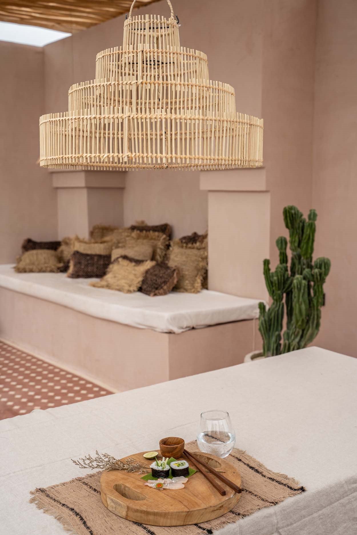 Wedding Cake rattan pendant light with organic design, great for boho dining or living spaces