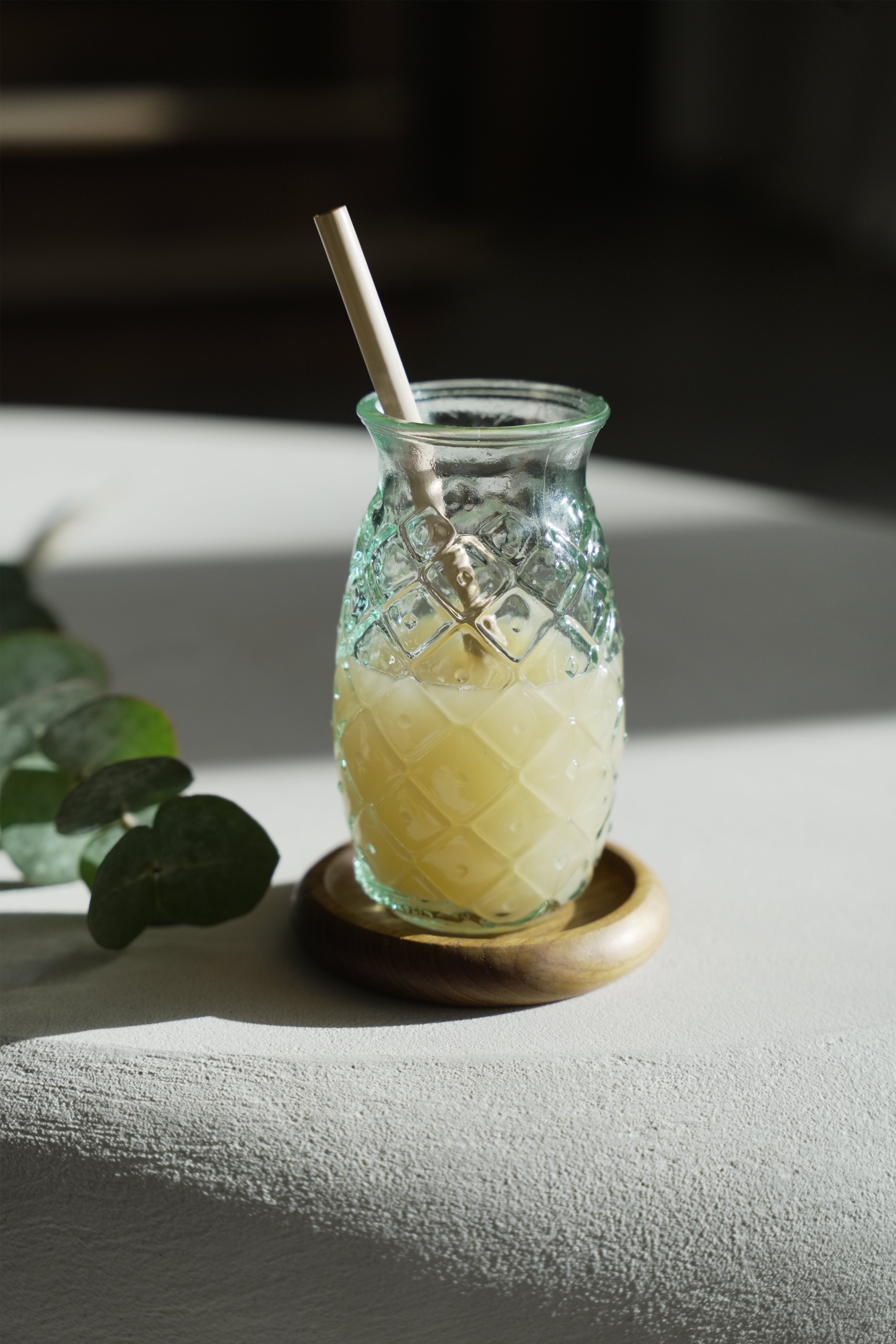 Blue pineapple glass with carved surface, perfect for summer drinks