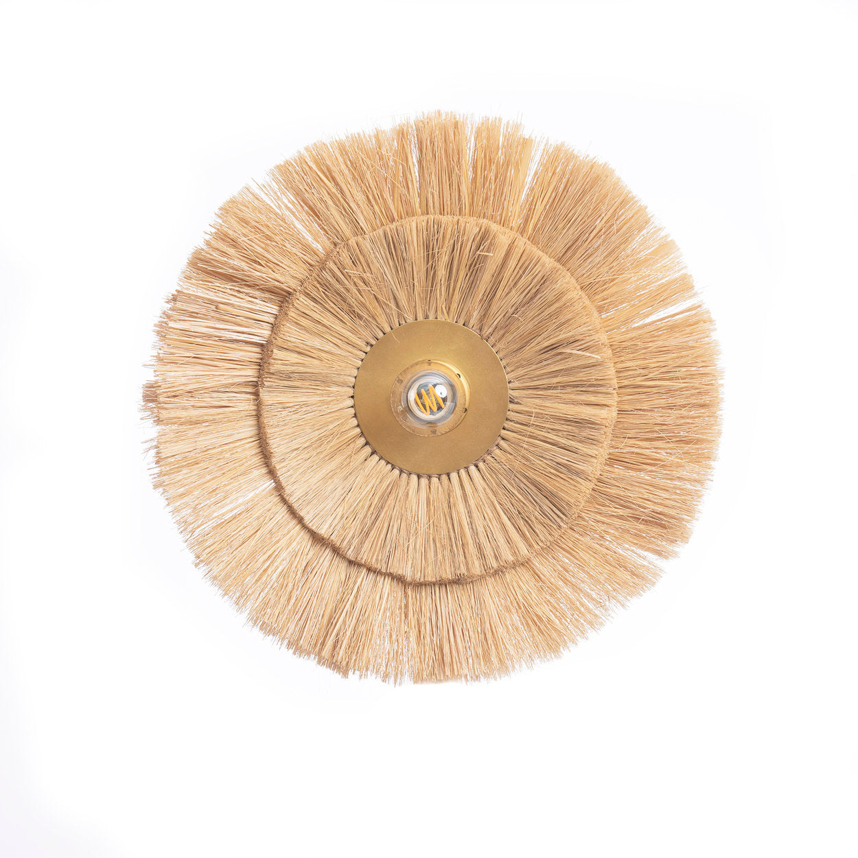 Two-layers grass round lamp handcrafted from natural materials, designed to cast a warm glow and add texture to modern boho interiors.