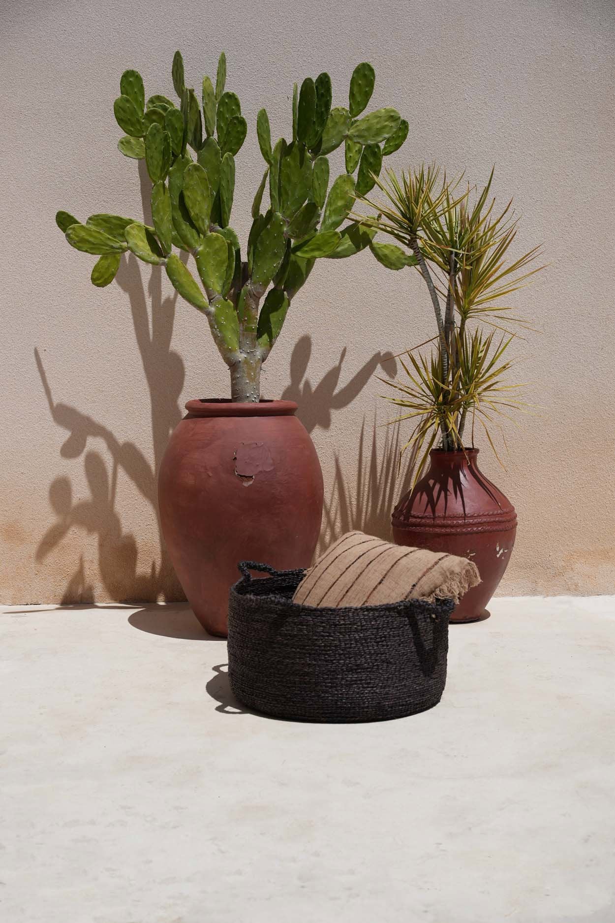 Handcrafted black seagrass basket for home organization, adding natural charm to your decor