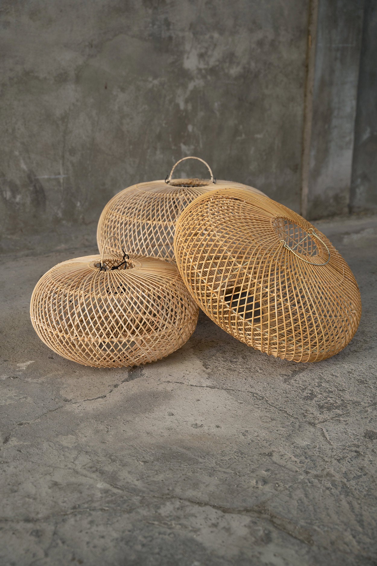 Handwoven rattan sphere designed for ceilings in bedrooms, lounges, or airy reading nooks.