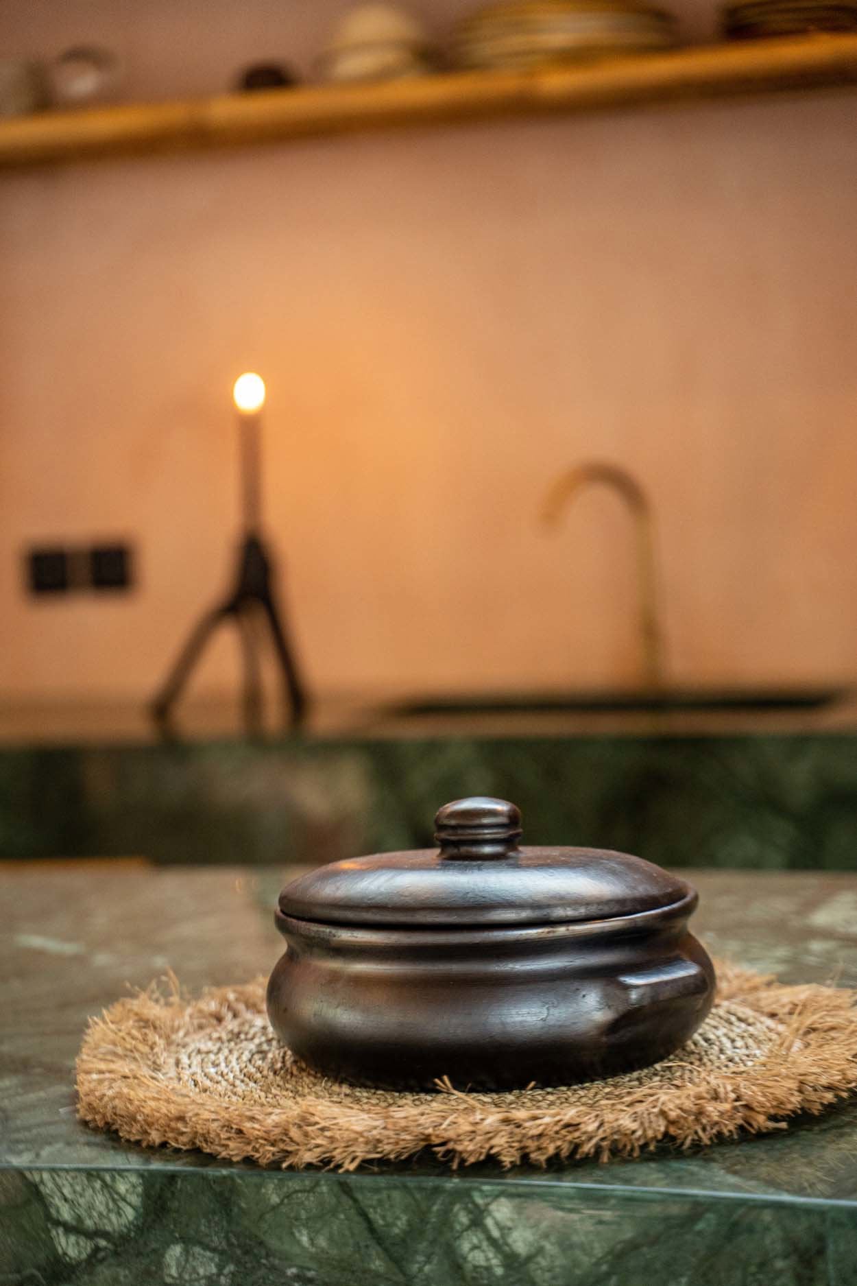 Handcrafted natural fiber placemat, lightweight yet sturdy, offering a charming and organic table accent.