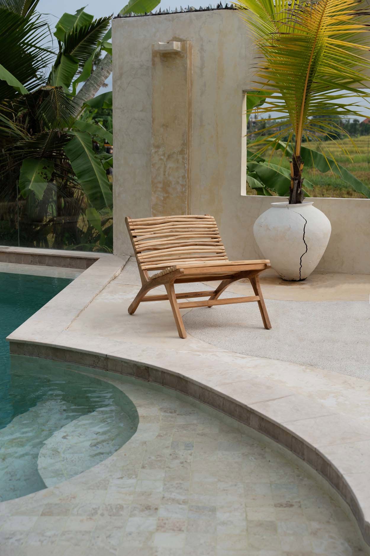 Boho-style teak wood lounge chair for a cozy and stylish space