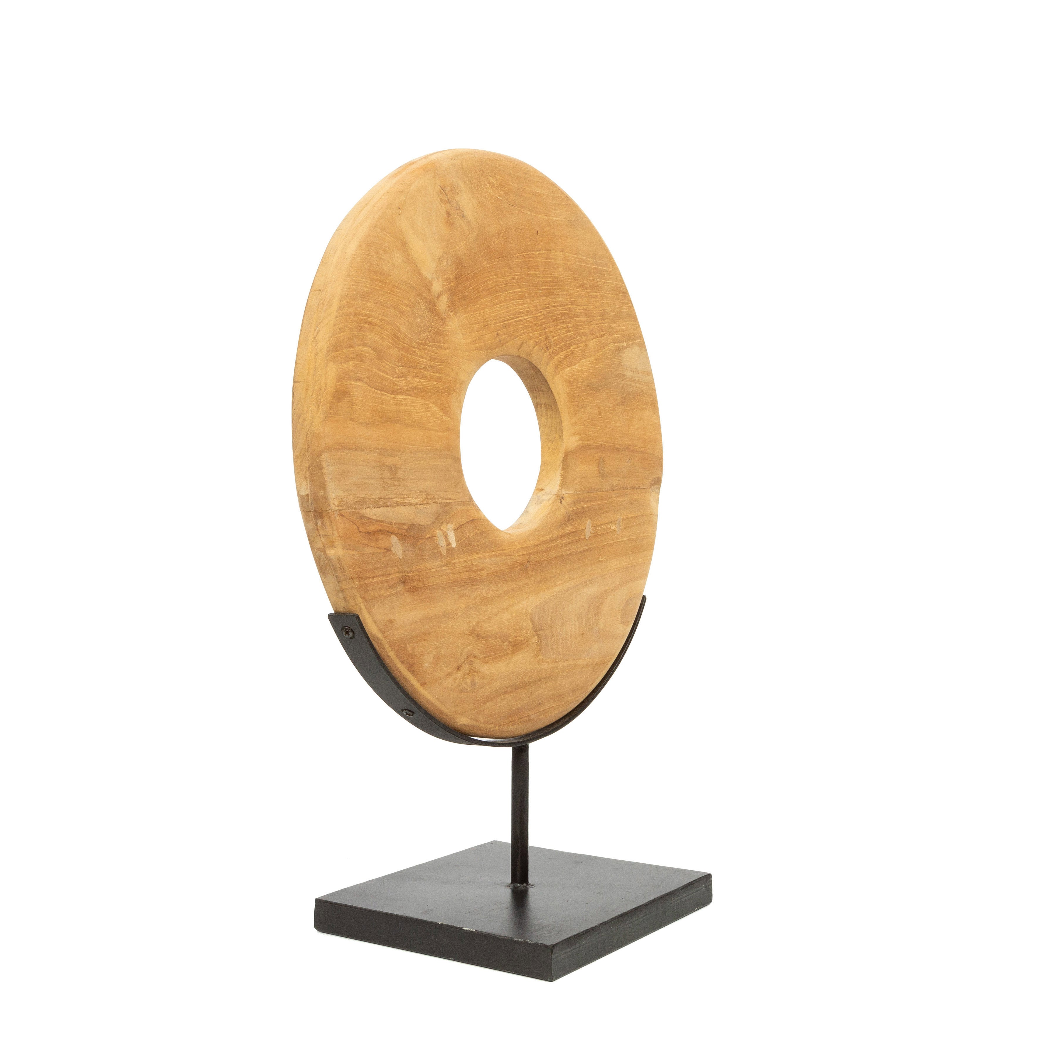 Minimalist teak sculpture stand for boho-inspired spaces
