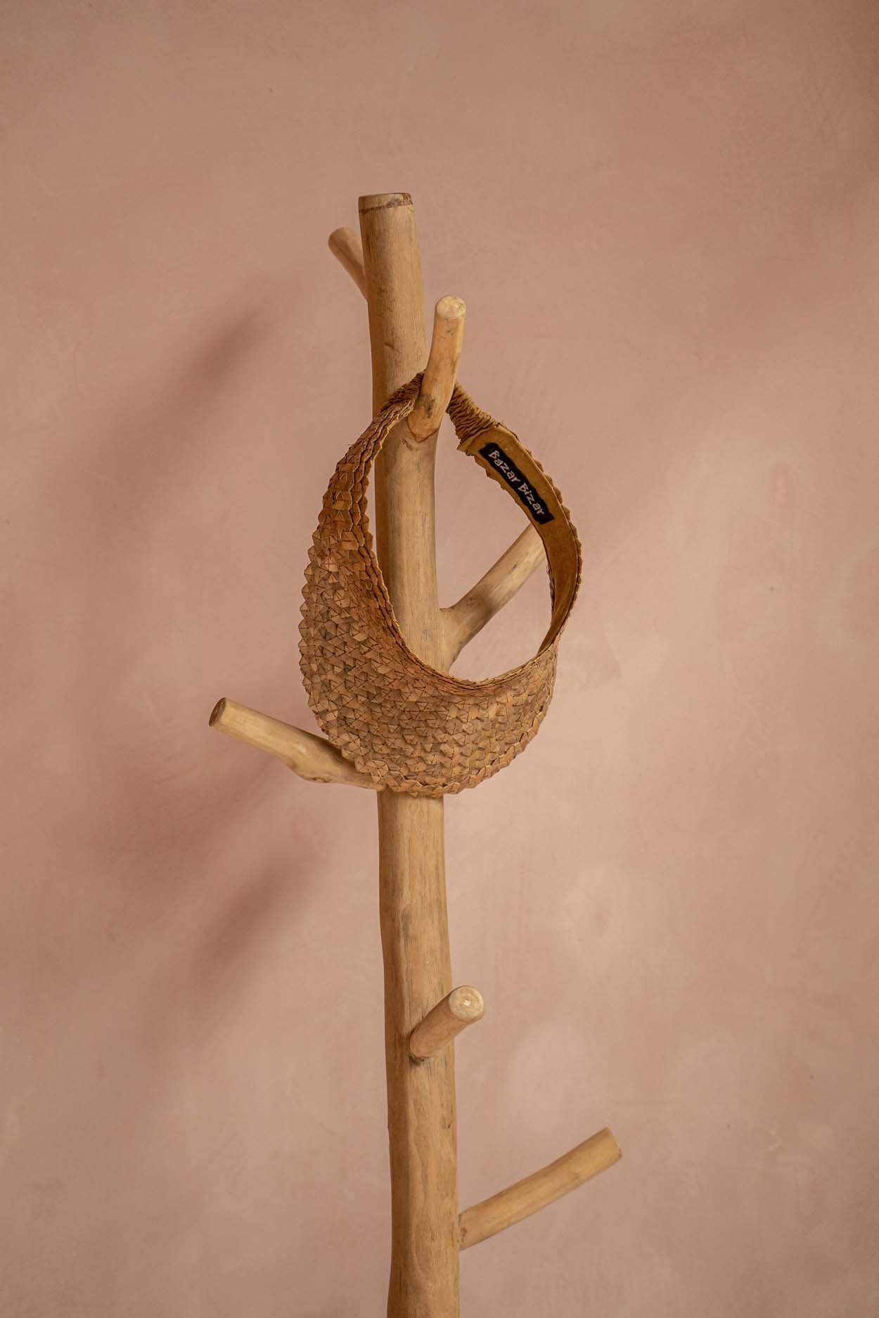 Modern wooden coat stand with sturdy concrete support