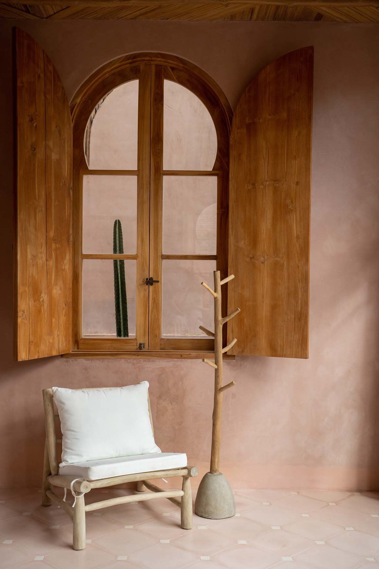 Handmade teak standing coat rack with concrete base