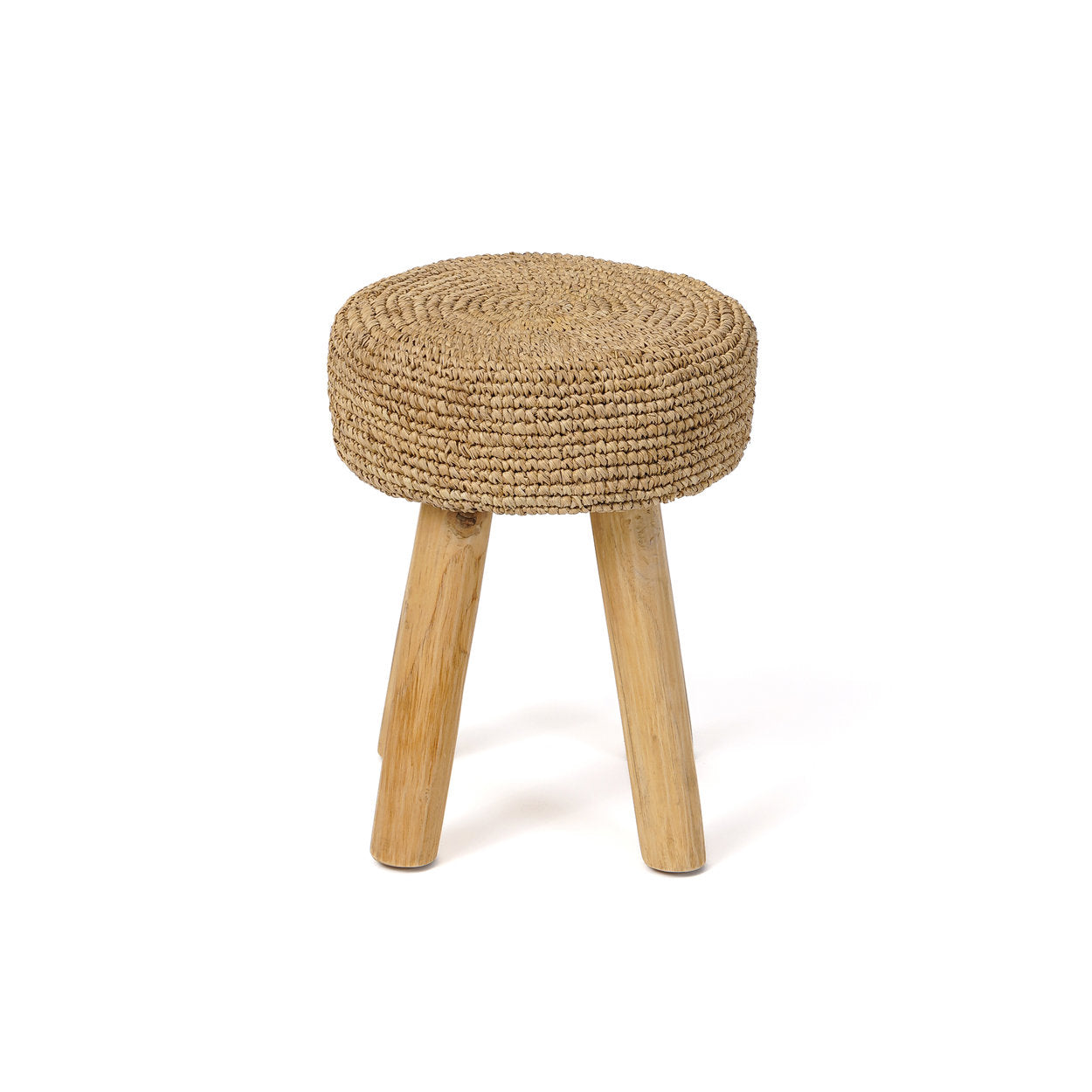 Neutral-toned raffia stool ideal for cozy reading corners