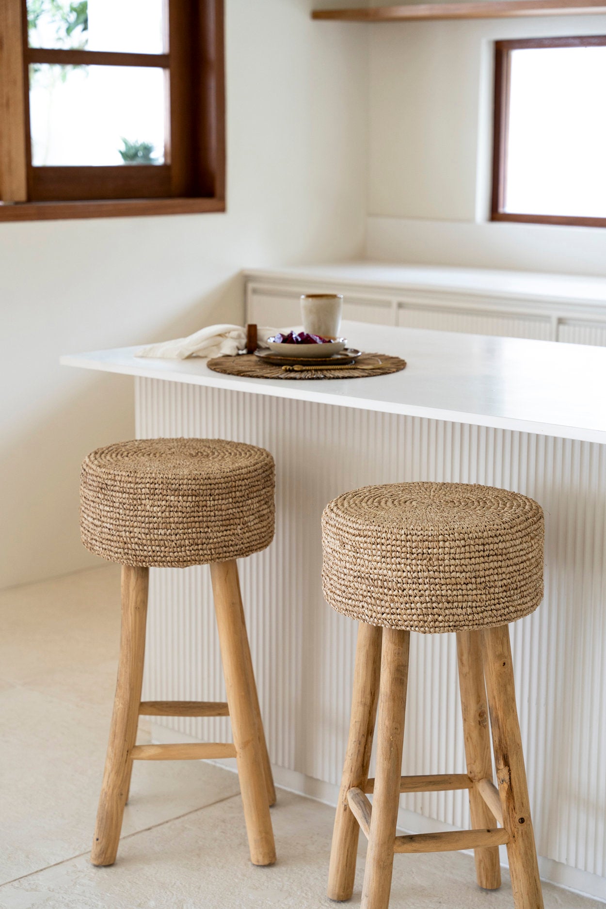 Boho chic bar stool with natural raffia seat