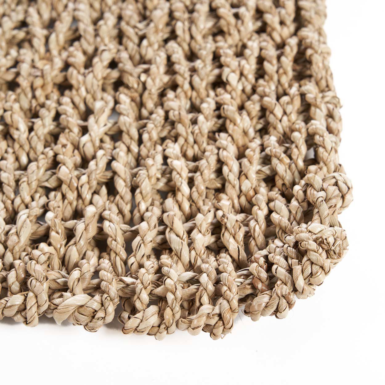 Handwoven boho runner in earthy tones, ideal for cozy reading corners or entryways.
