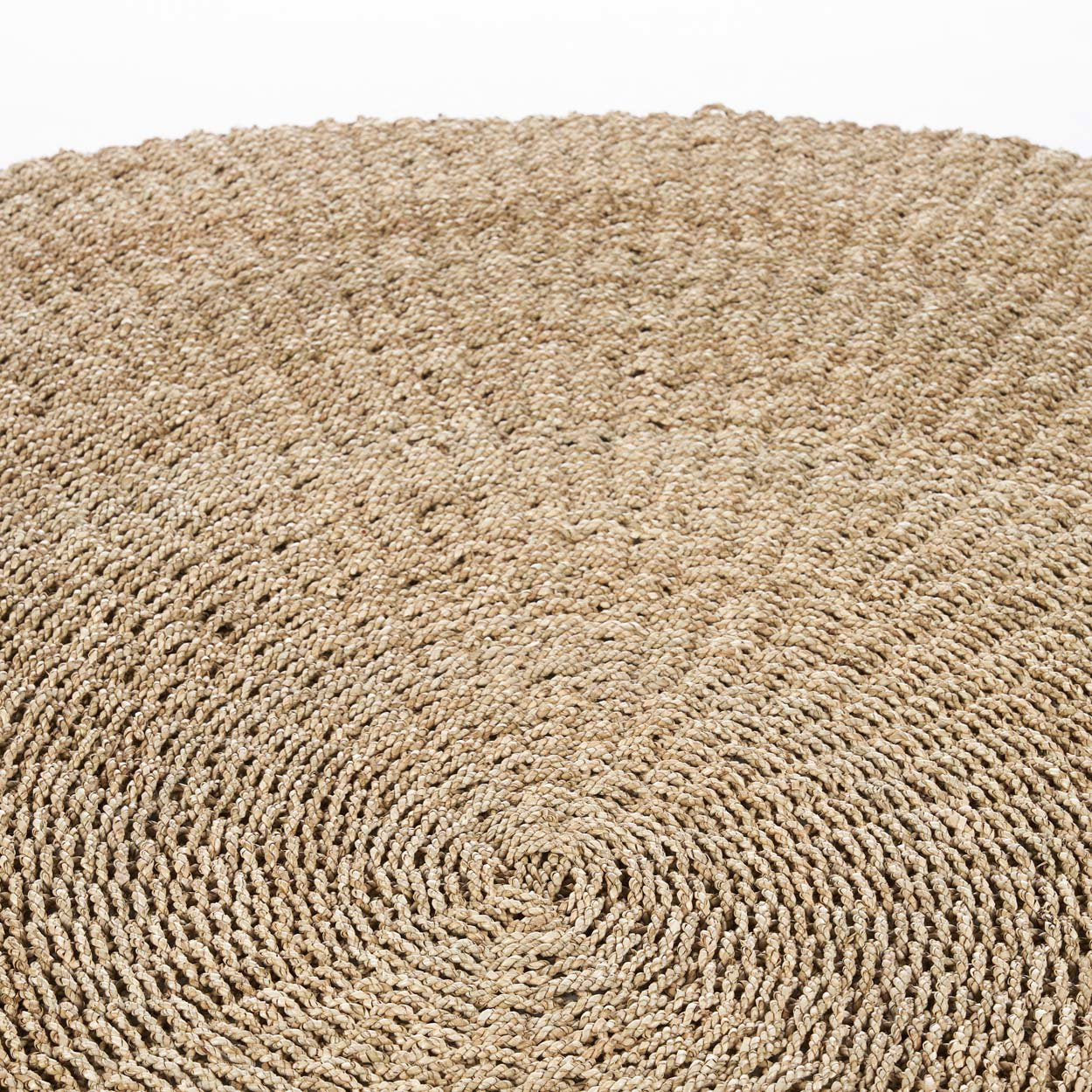Textured natural rug designed to add warmth and depth to your home decor