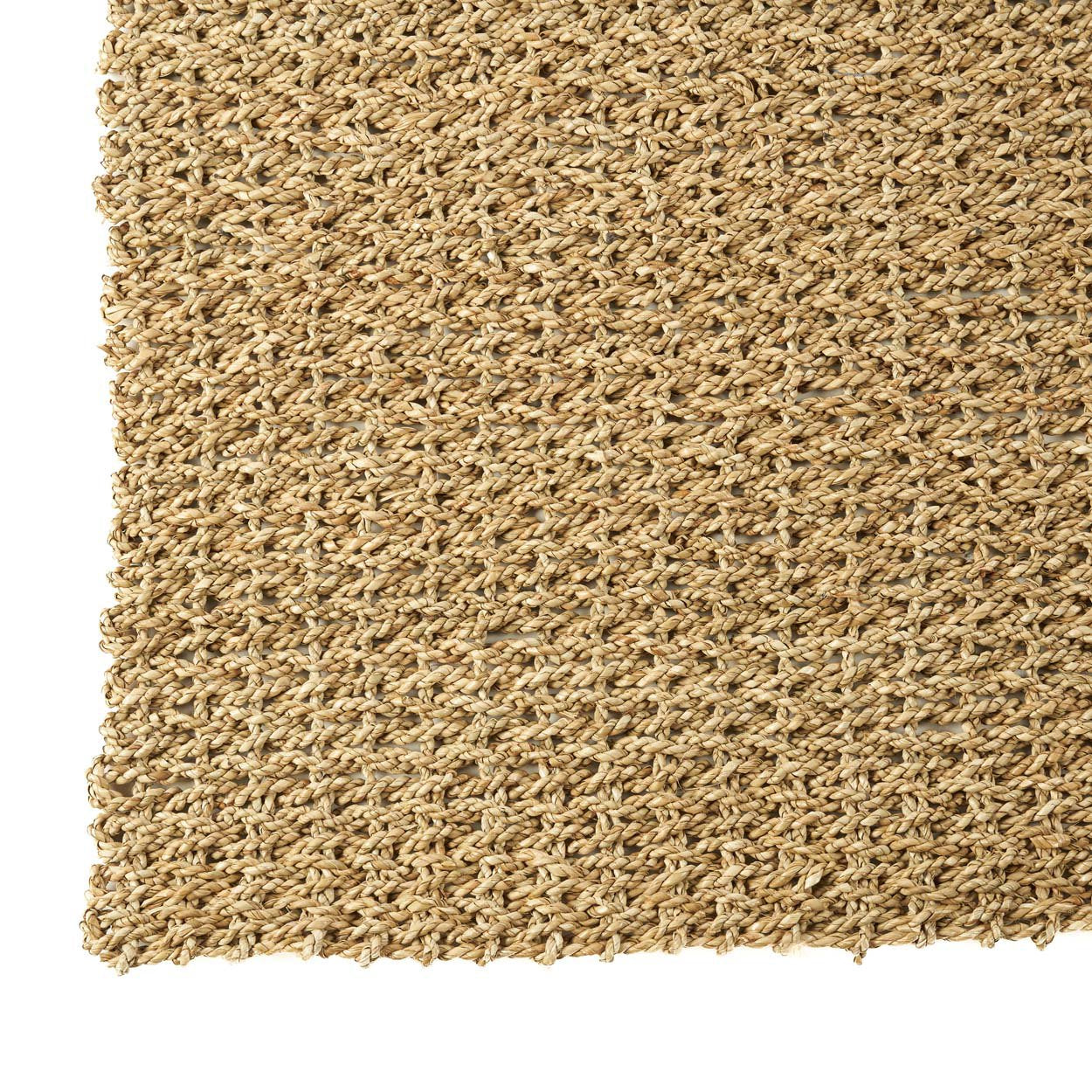 Brown large carpet for living room featuring raw organic texture