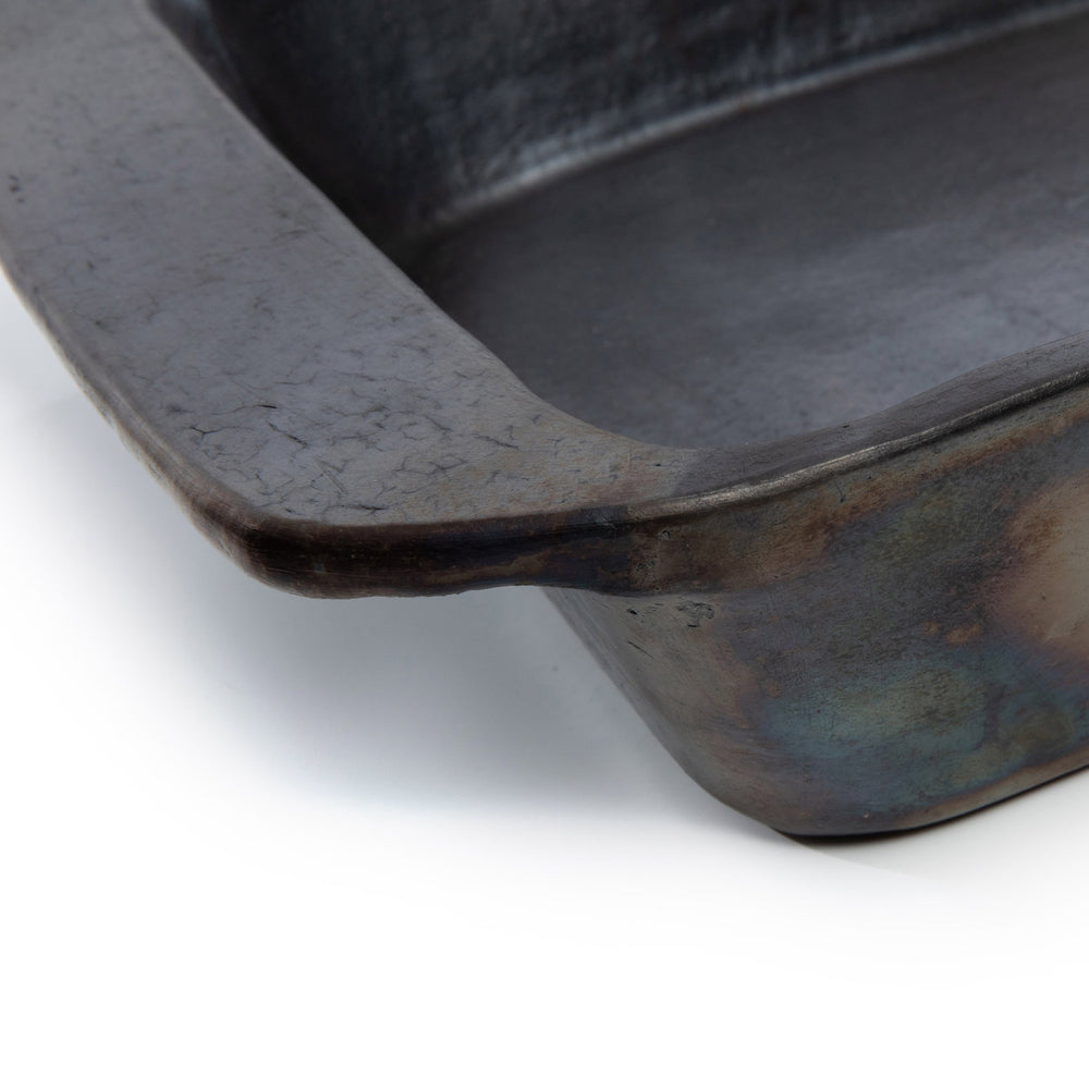 the-burned-oven-tray-black