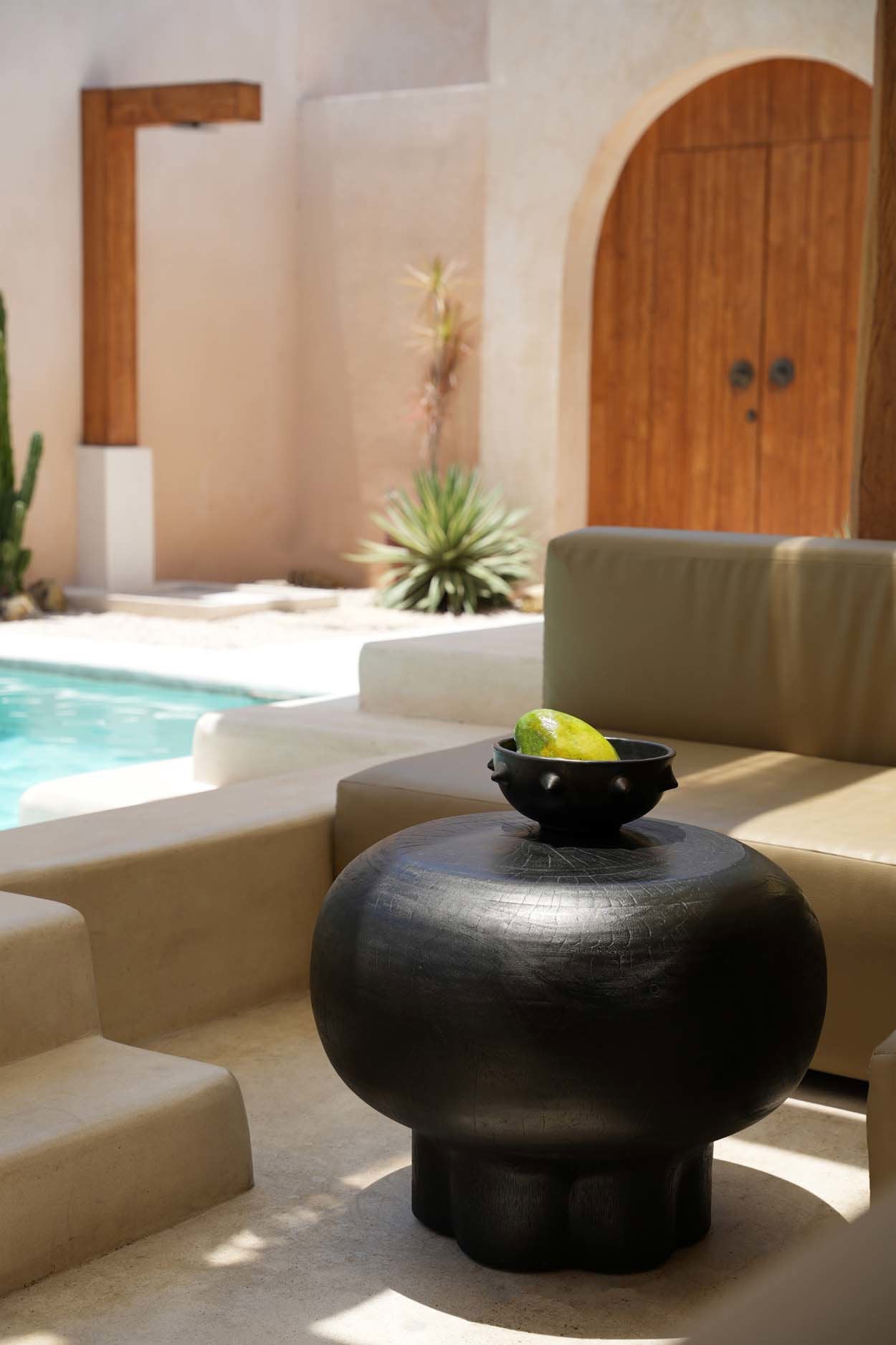 Unique handmade black terracotta bowl, decorative ethnic design with dramatic edge detail.