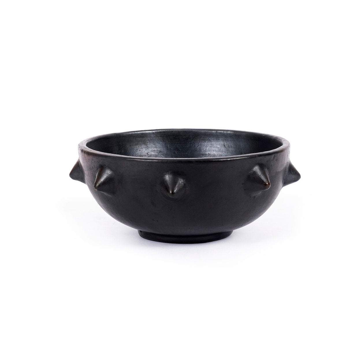 The Burned Ethnic Bowl, handmade black ceramic bowl with spiky rim for bold dining style.