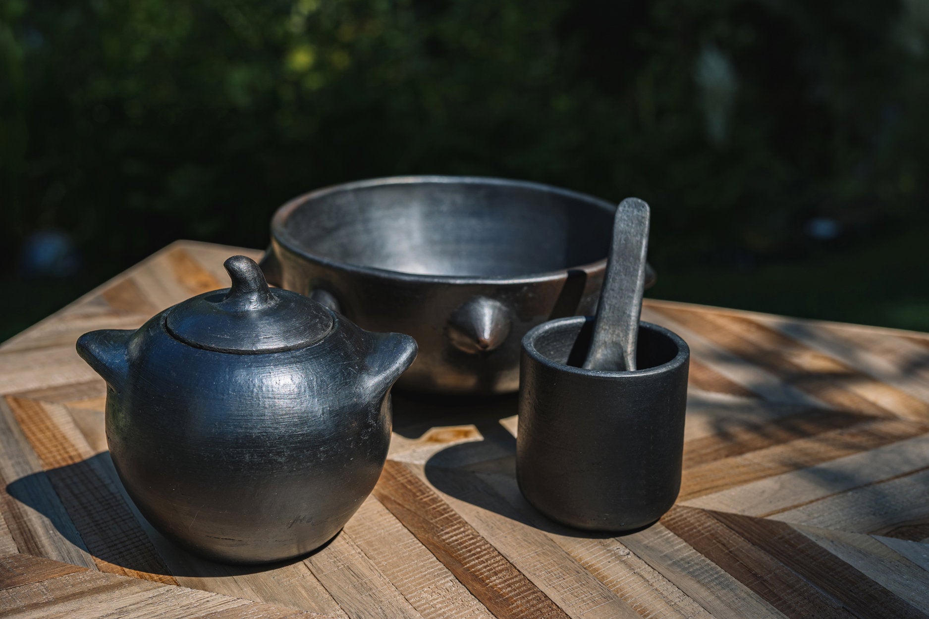 Large black ceramic jar, durable and stylish, ideal for organizing spices or dry goods.
