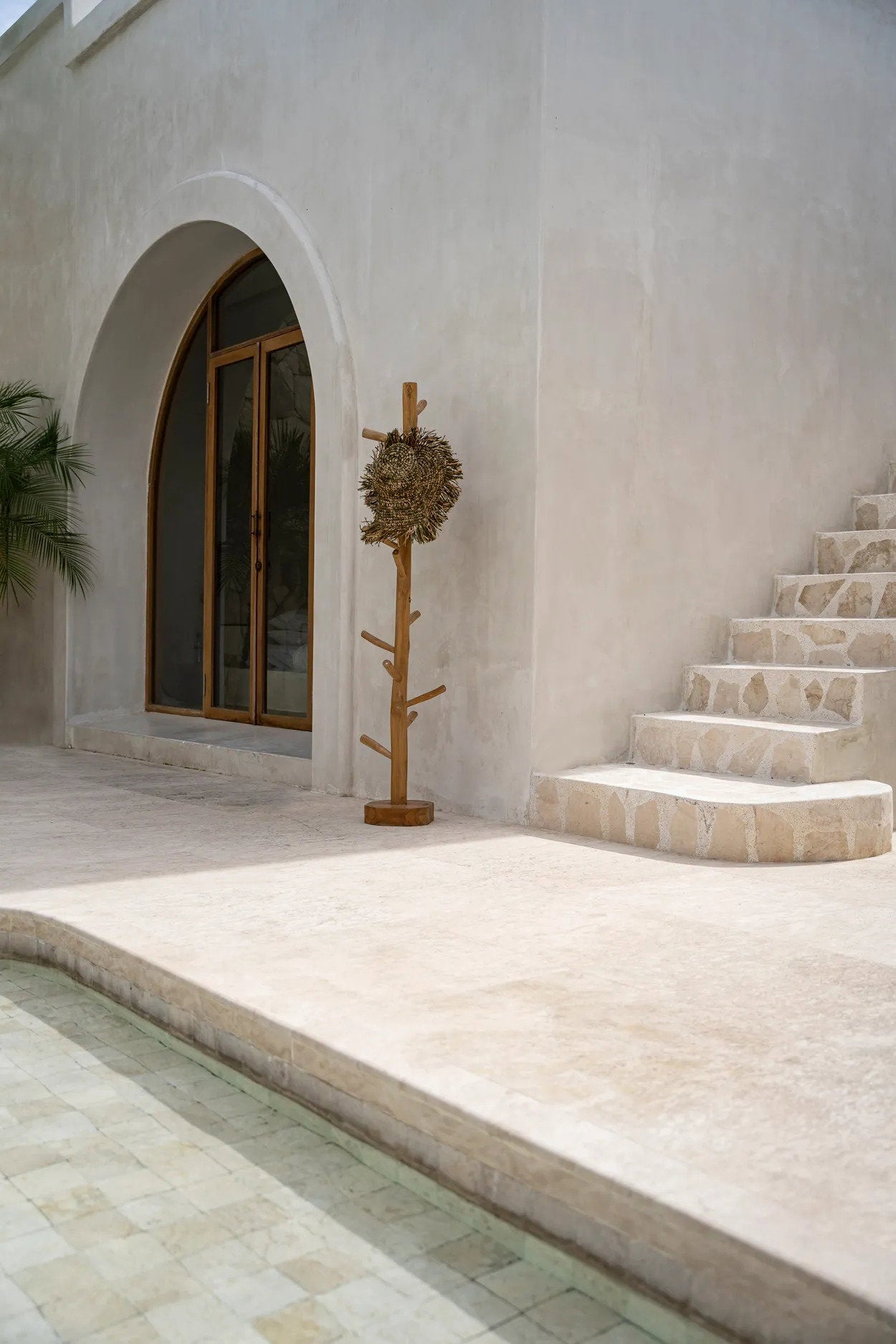 Sustainable teak coat rack for organizing coats, hats, or bags in style