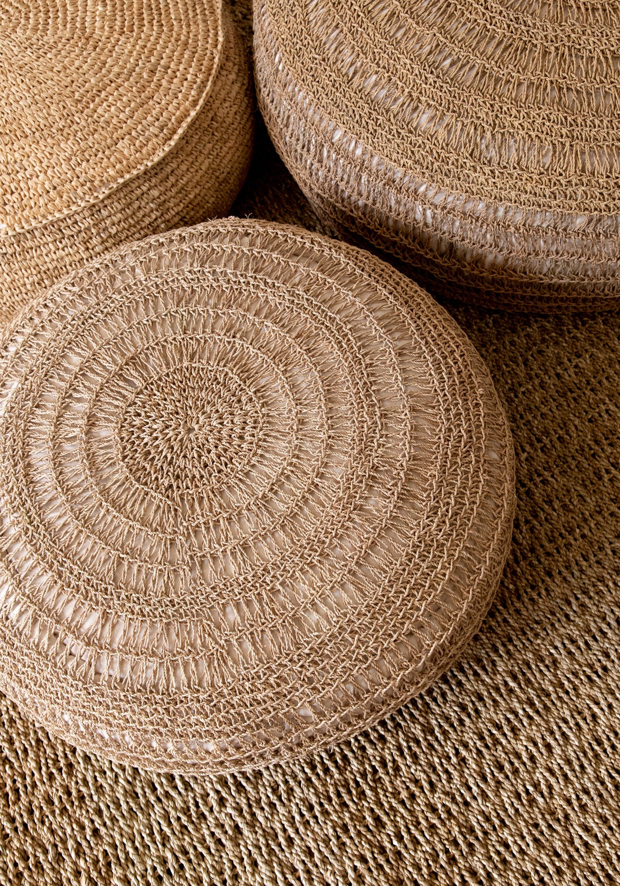 the-raffia-flores-pouffe-natural