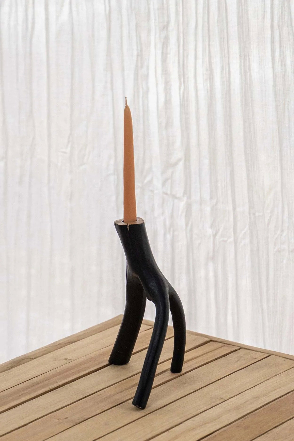 Minimalist black wood candle stand with handcrafted branch design