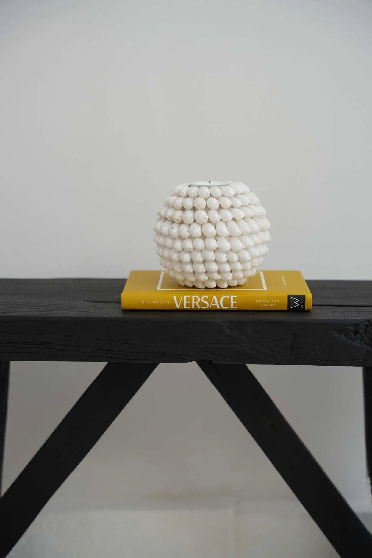 Coastal-style white candle holder with bubble-shaped design