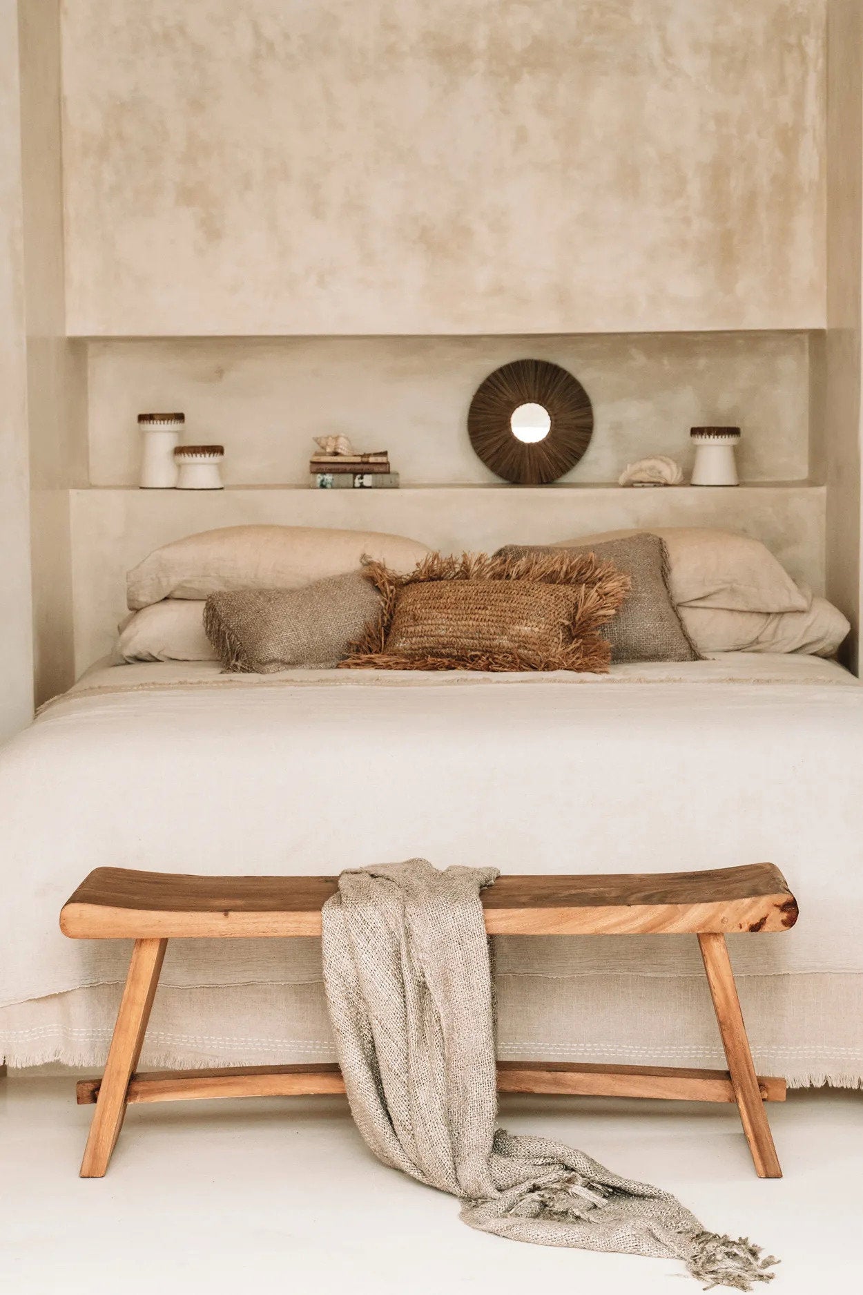 Small natural wall mirror framed with Alang Alang grass, reflecting light beautifully and complementing earthy interiors.