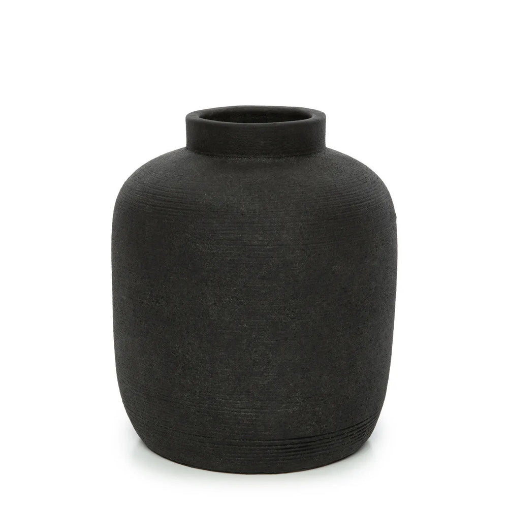 A matte black vintage vase featuring an urn-like silhouette with soft horizontal ridging and a short, raised collar neck.