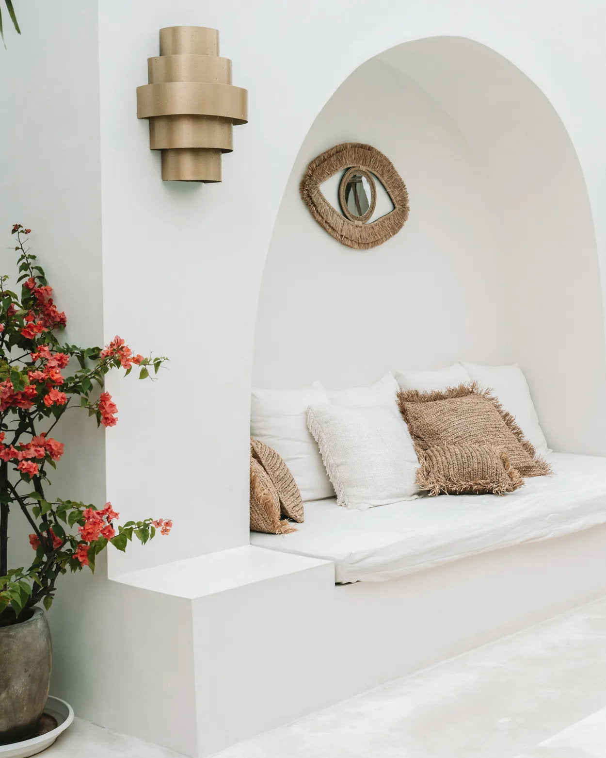 Eye-shaped natural wall mirror reflecting light beautifully, enhancing interiors with artistic and organic flair.