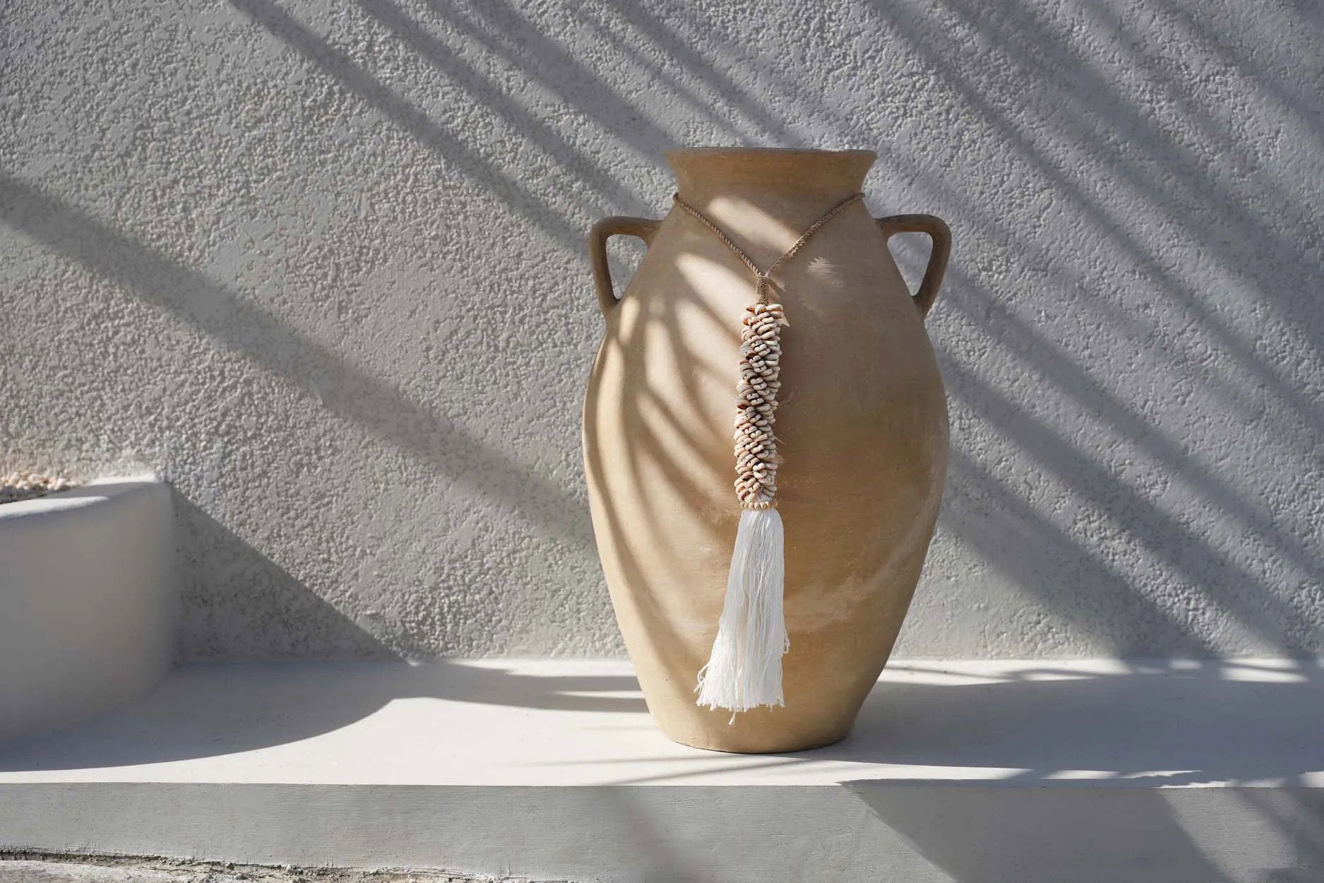 the-cowrie-cotton-tassel-natural