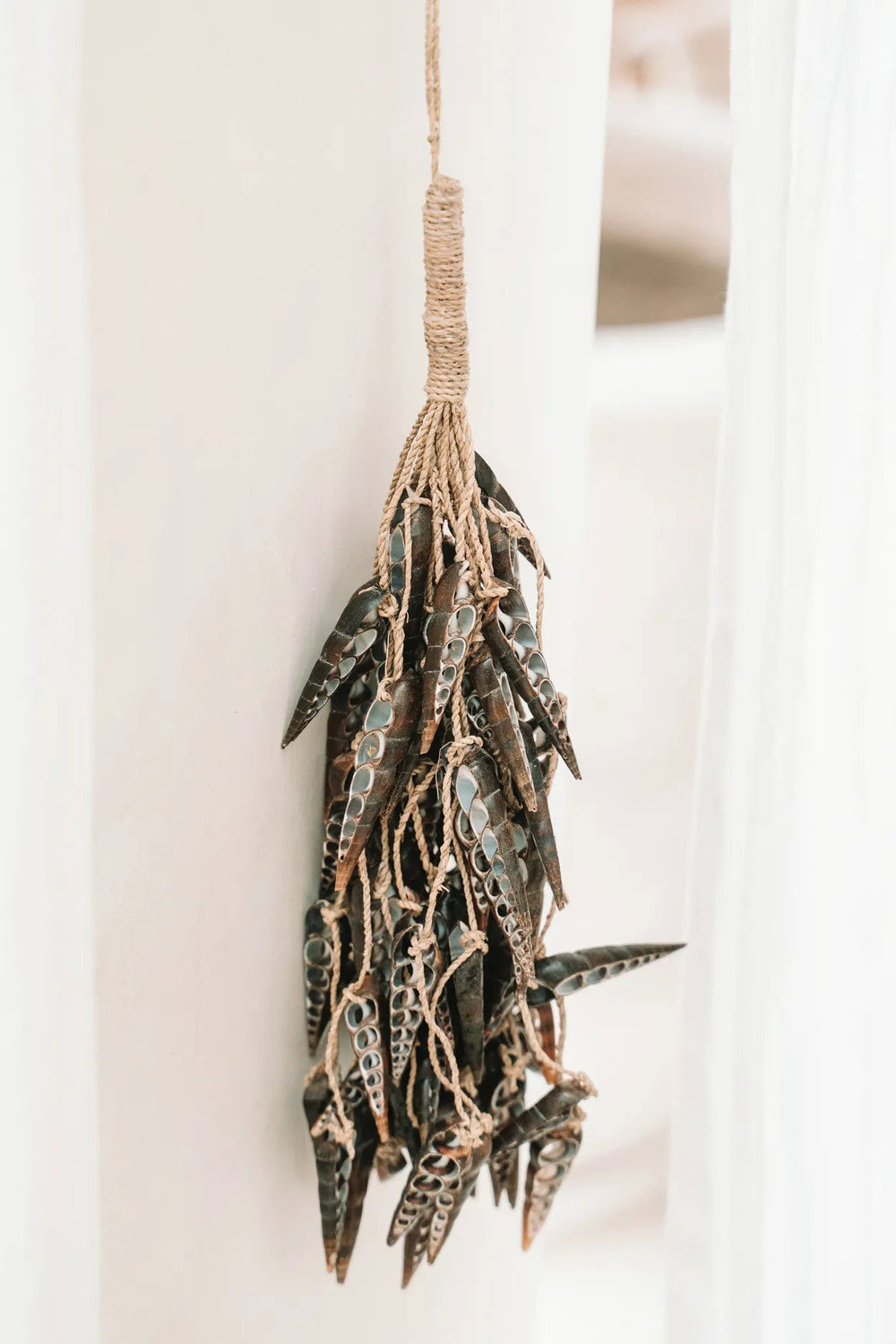 the-unicorn-shell-tassel-brown