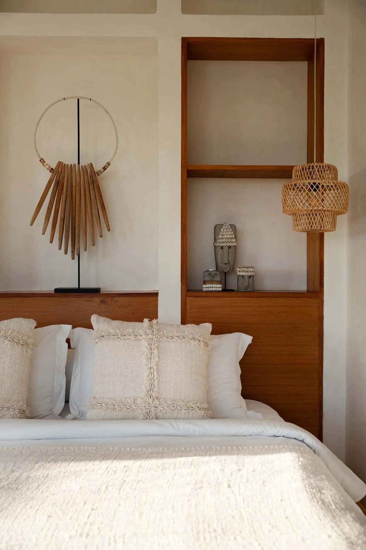 Small tribal stone carving with playful shell detail, bringing charm and personality to any space.