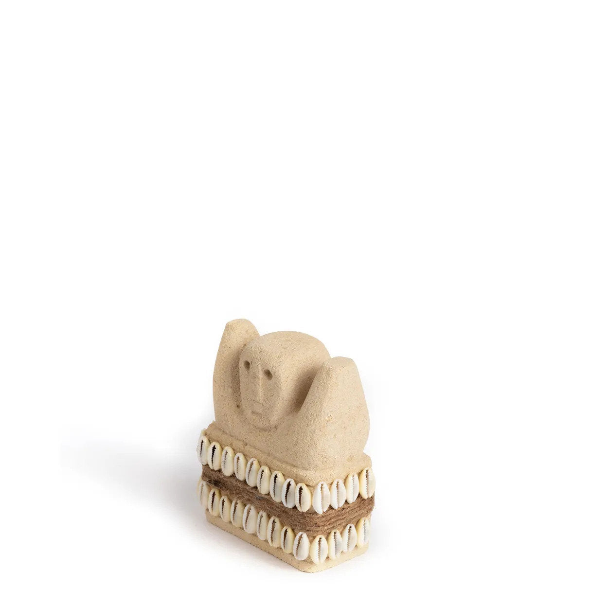 Artisan-crafted small sandstone figurine, perfect for creating curated arrangements with other decorative pieces.