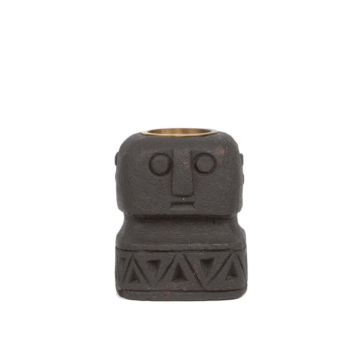 Stone candle holder hand-carved with tribal Sumba face design