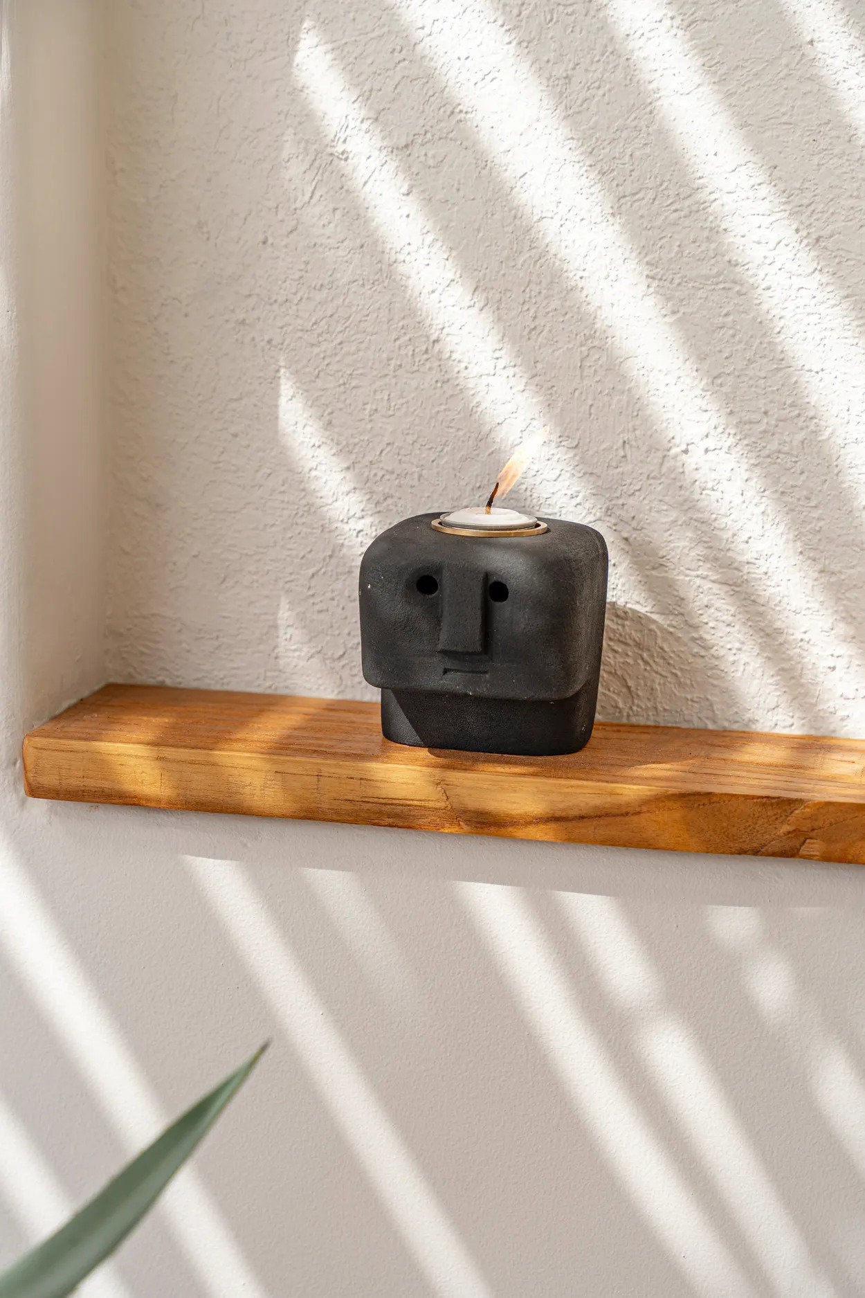 Handmade candle holder inspired by traditional Sumba art
