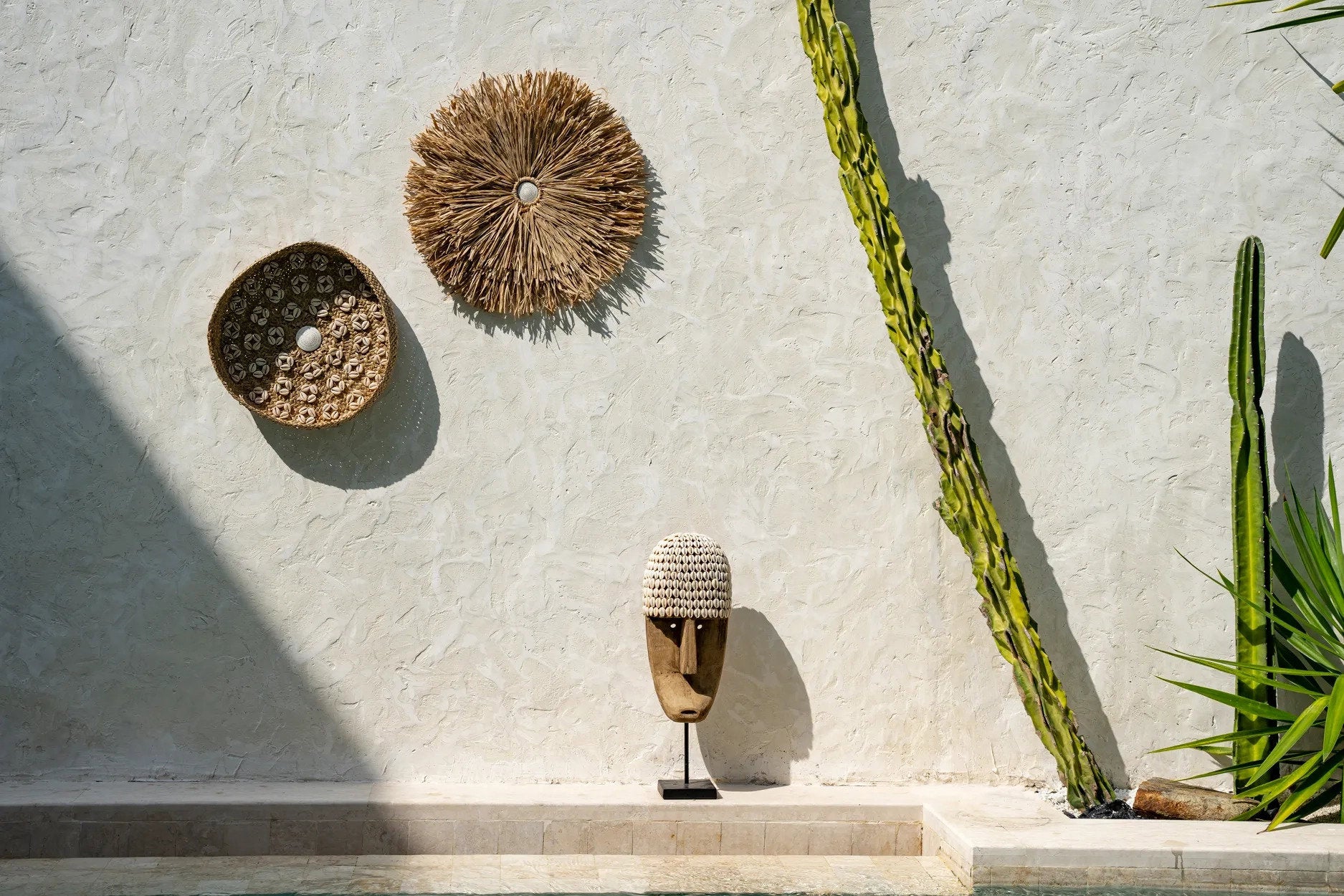 the-cowrie-mask-on-stand-medium