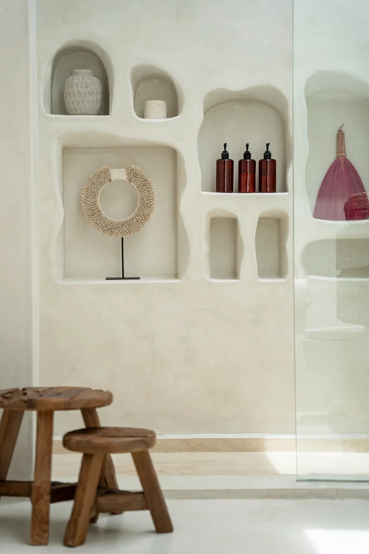 Symmetrical shell design on stand, showcasing texture and timeless craftsmanship