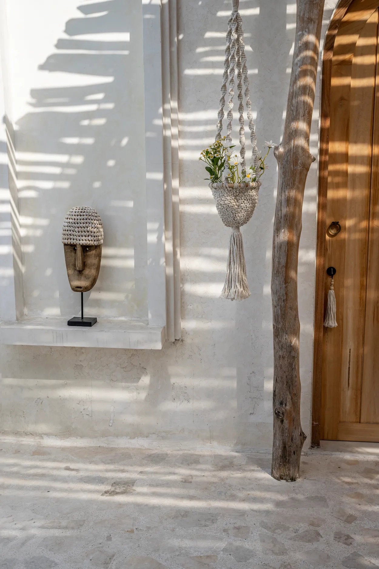 the-cowrie-mask-on-stand-large