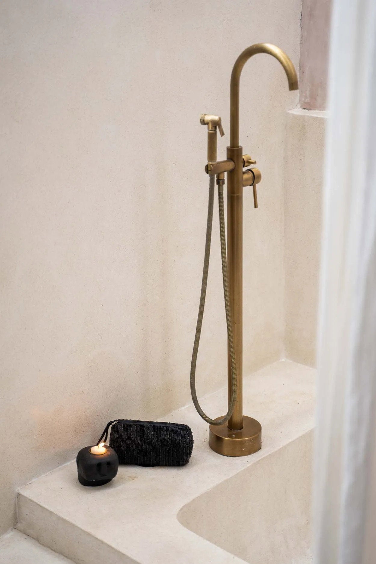 Black stone decorative candle holder for rustic or ethnic home accents