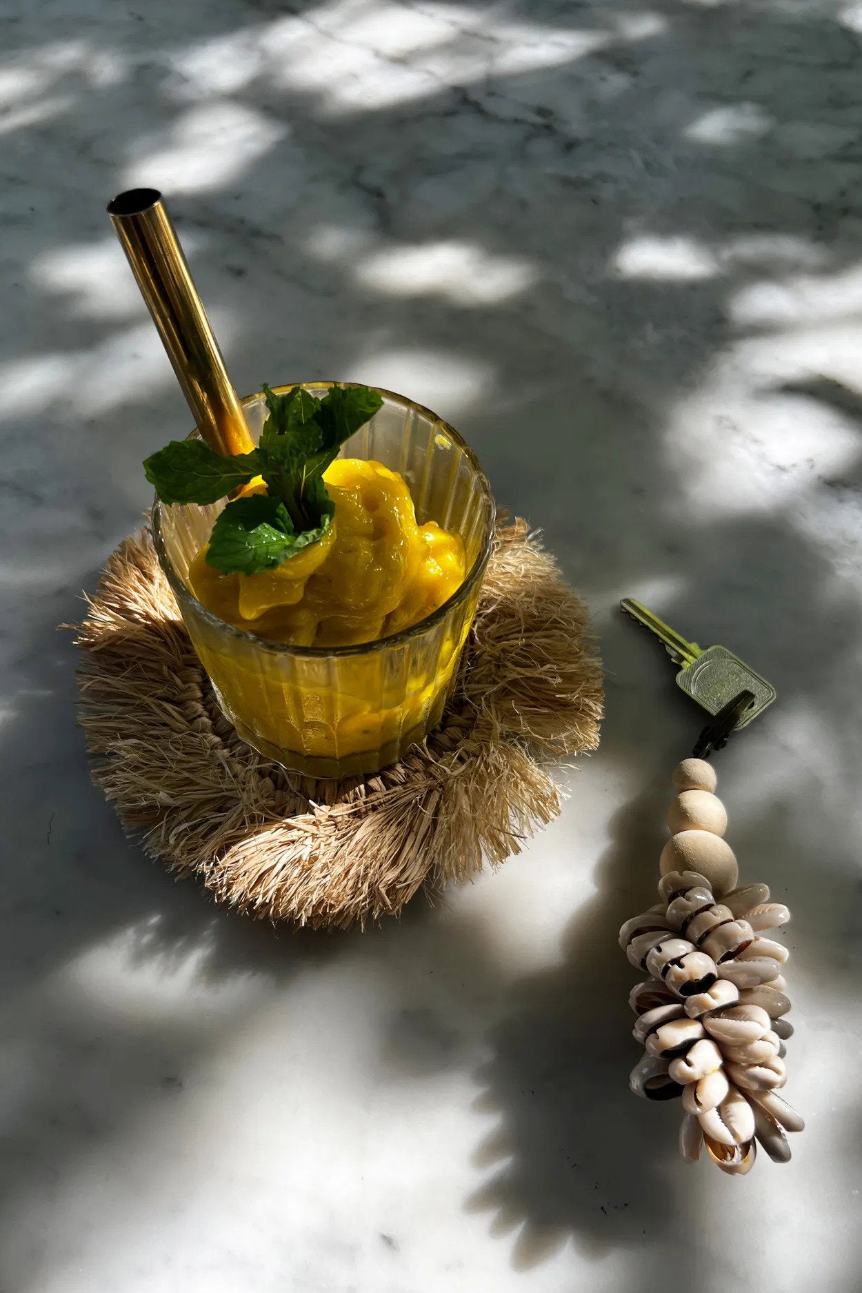 Stylish handmade natural raffia coaster, offering a distinctive touch to everyday drinks and gatherings.