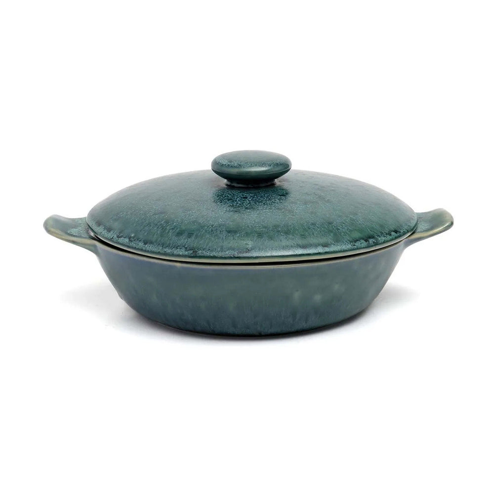 An artisanal ceramic stew pot with lid in aqua blue tone, enriched with unique texture and handles.