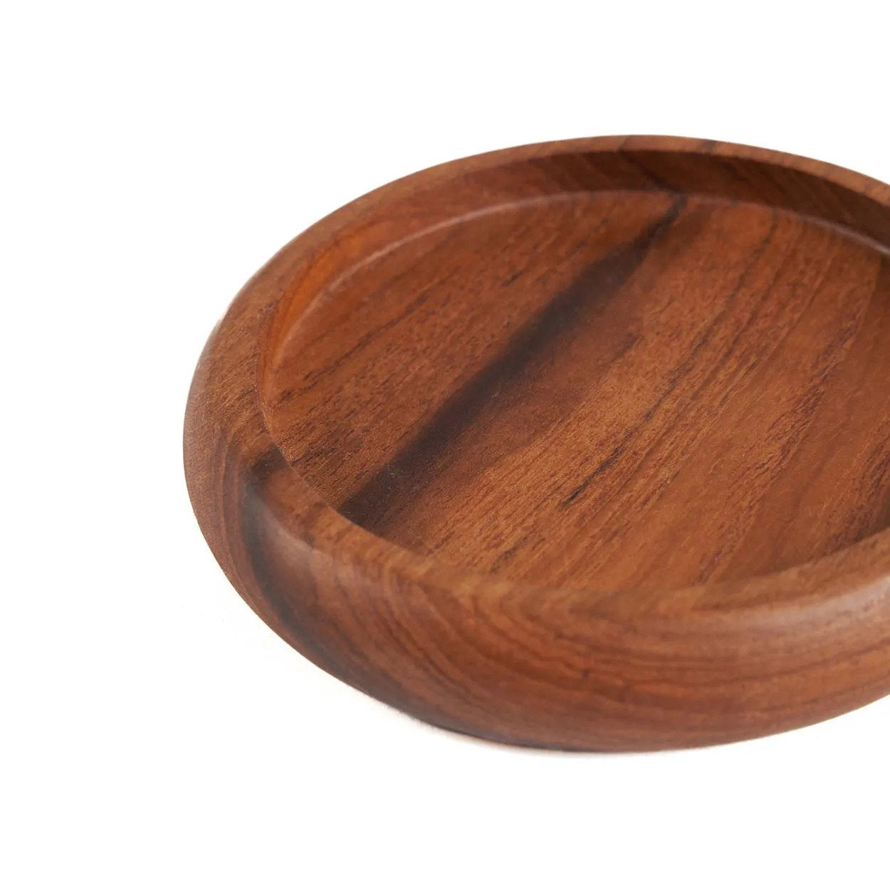 Durable teakwood coaster, lightweight yet sturdy, perfect for coffee, tea, or cocktail settings.
