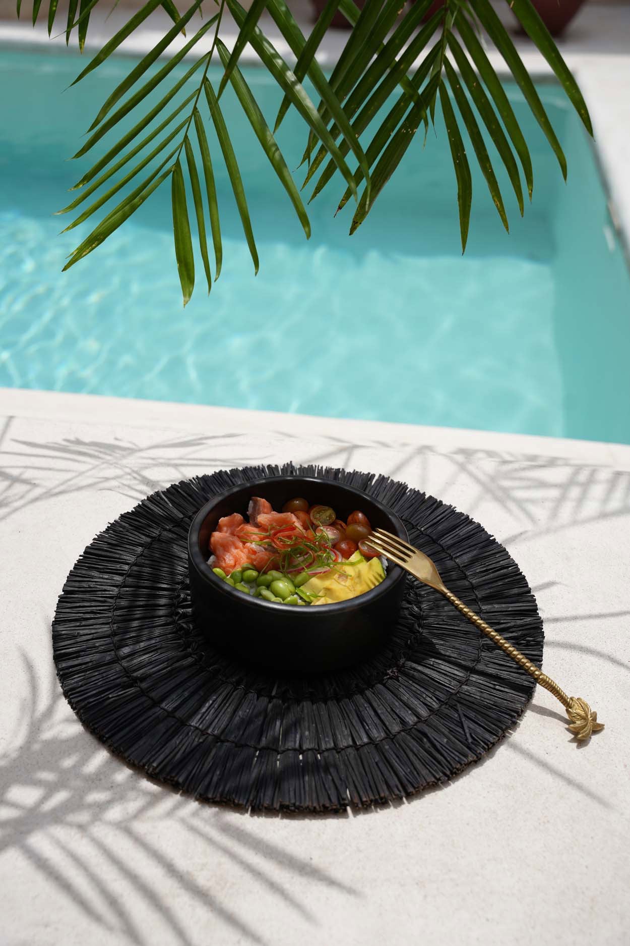 Handcrafted black ceramic cylinder dishes, versatile sizes for serving appetizers, sauces, or main dishes.