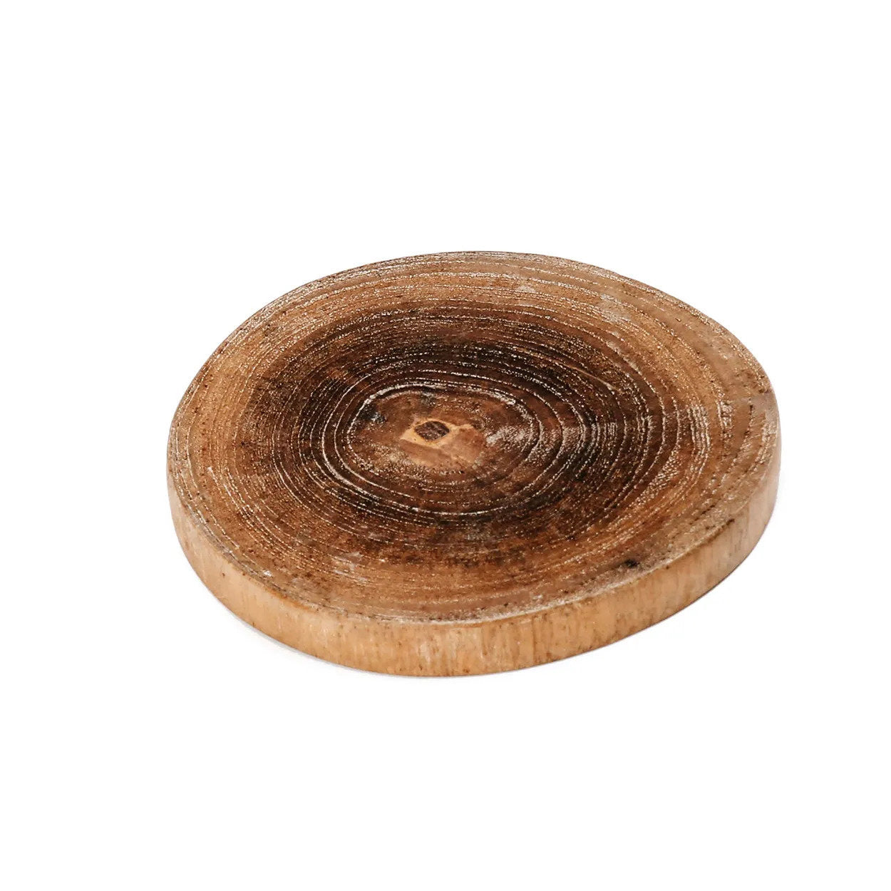 Rustic wooden coaster handcrafted from teak root, perfect for adding boho charm to your table.