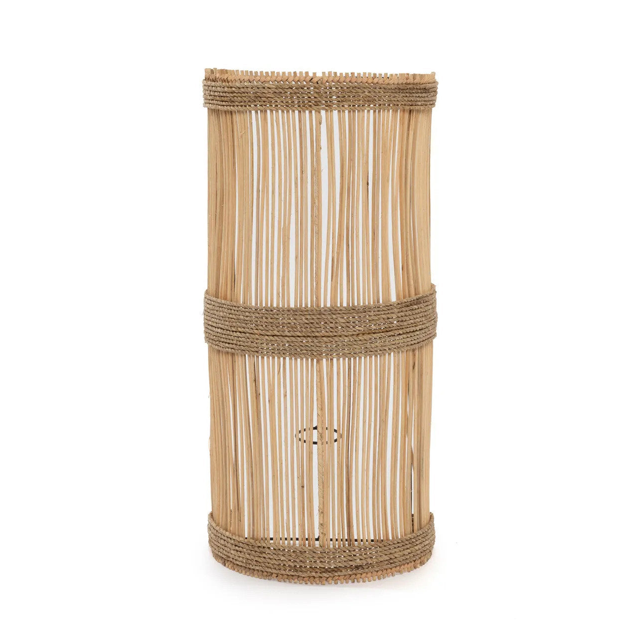 Handmade rattan wall lamp with a natural woven design, casting a warm ambient glow, perfect for boho or coastal-inspired interiors.