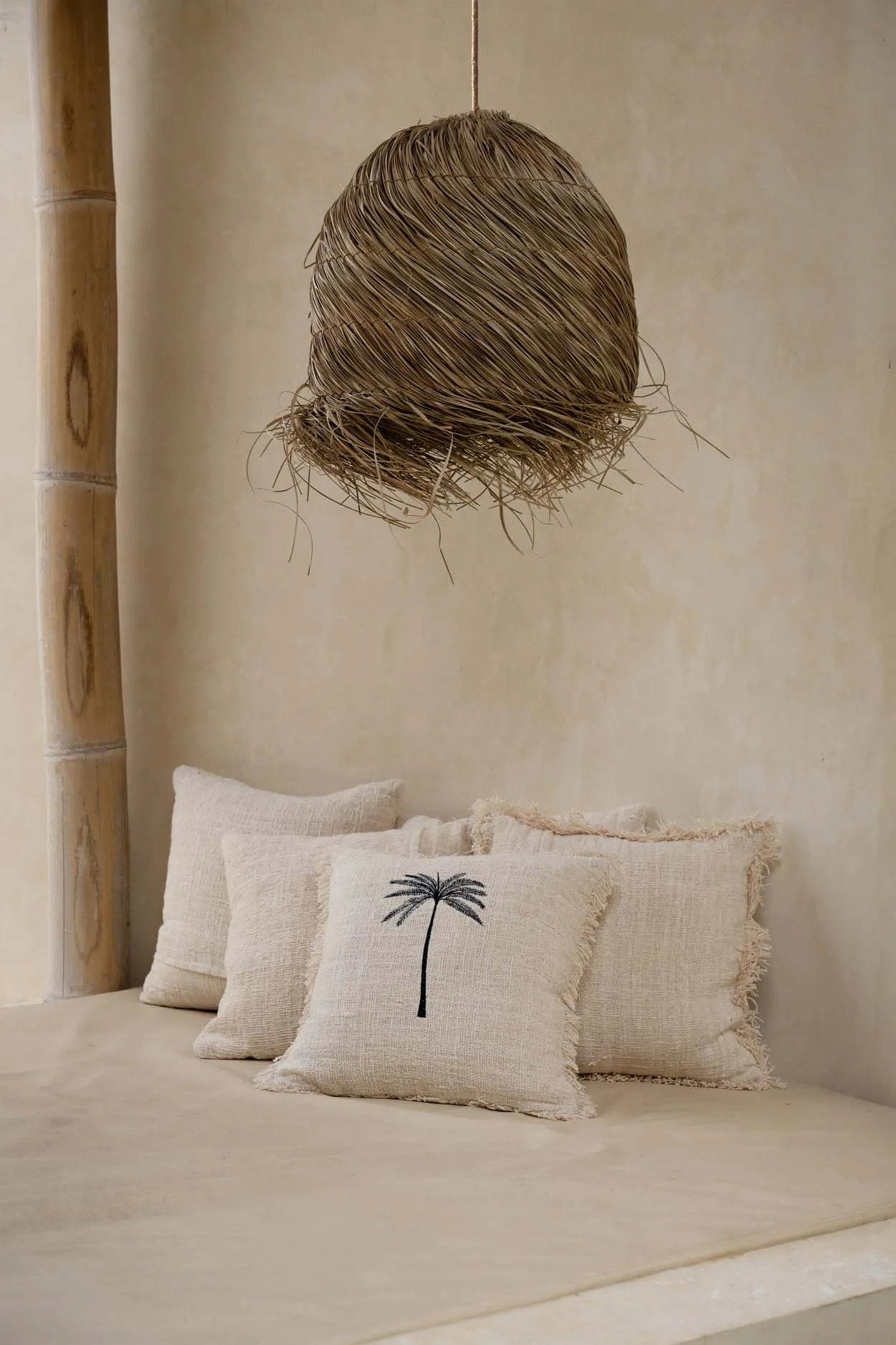 Square throw pillow cover with palm leaf design, perfect for any room
