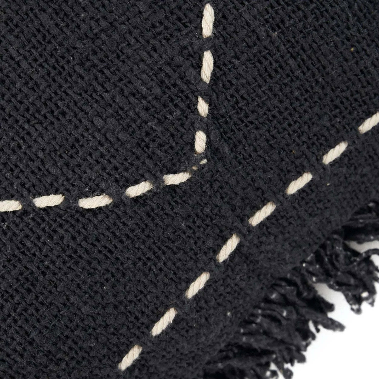 Cozy black boho cushion cover for a chic and comfortable couch