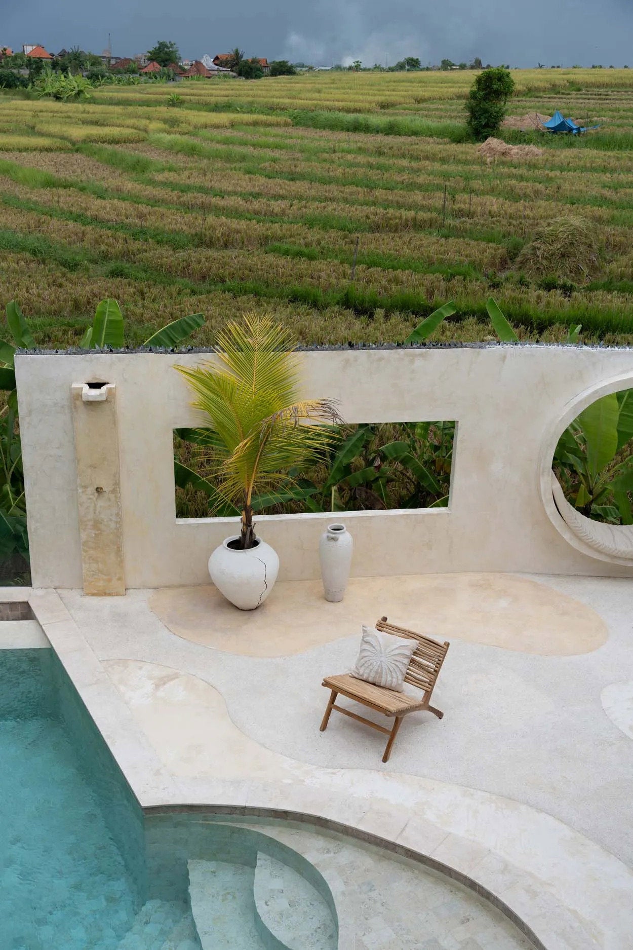Tropical palm leaf cushion cover for a boho-chic living room