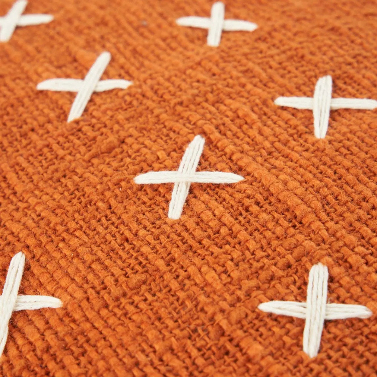 Zillion Kiss cushion cover with terracotta tones for a chic, relaxed vibe