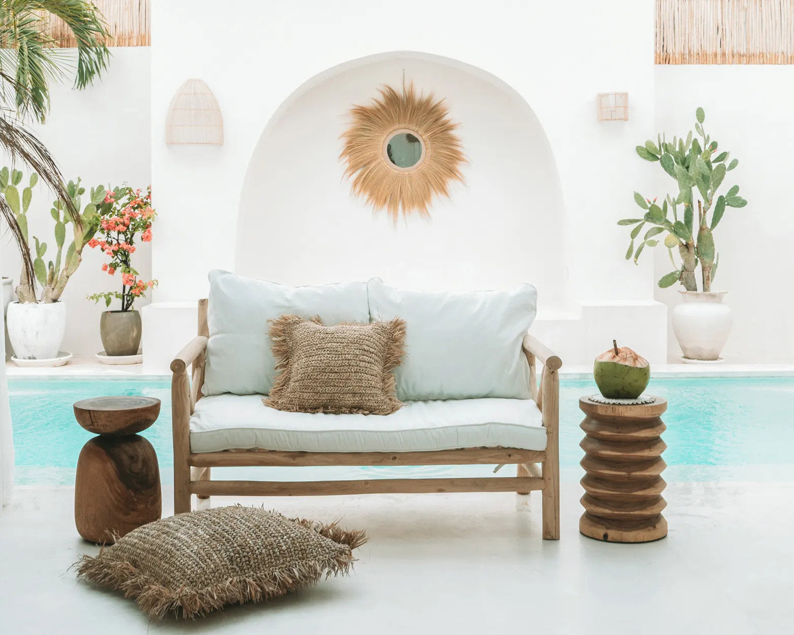 Boho-style square raffia cushion cover, perfect for indoor or outdoor use.